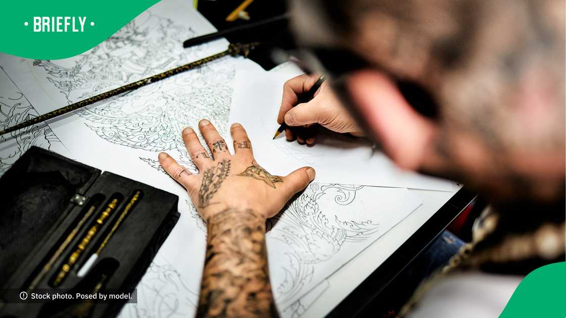 Because he can't move his limbs, the talented man uses his mouth to create. Because he can't move his limbs, the talented man uses his mouth to create.