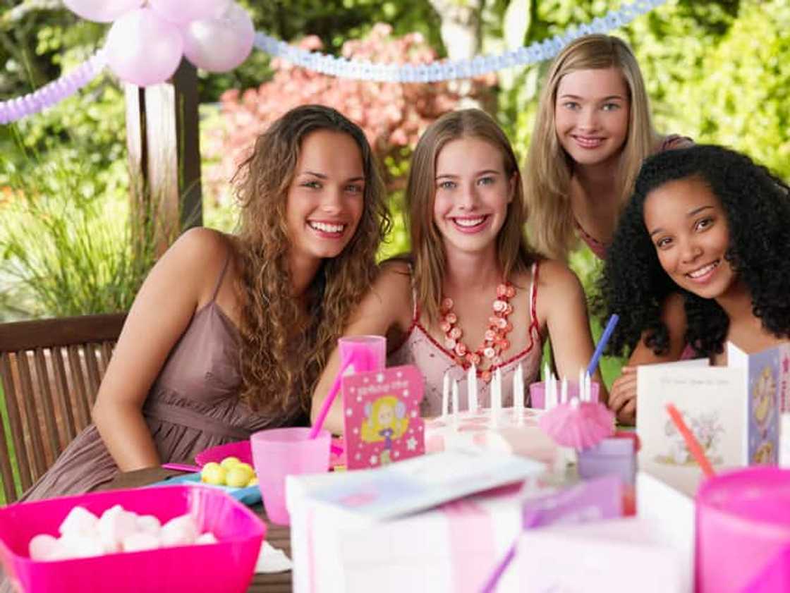 Four teenage girls at birthday party Four teenage girls at birthday party