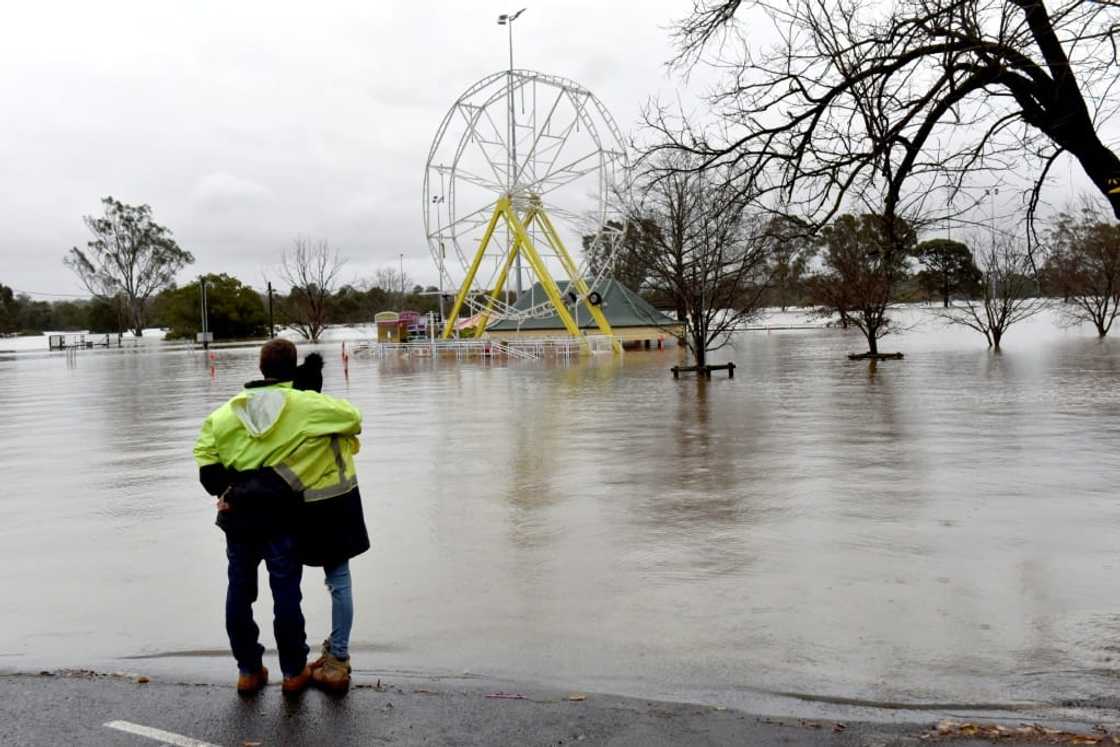 Thousands of Australians were ordered to evacuate their homes in Sydney as torrential rains battered the city