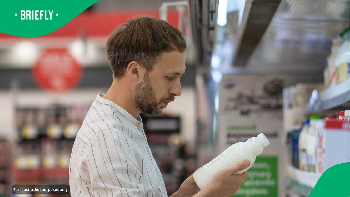 A person in a store. A person in a store.