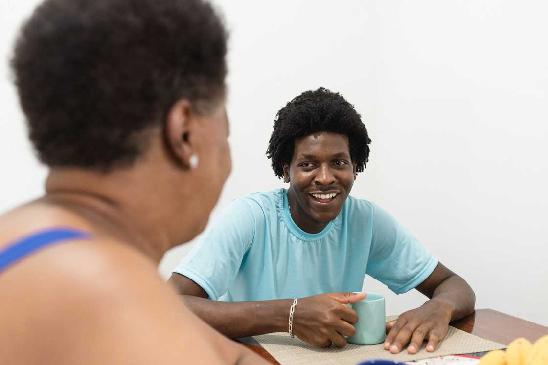 A caring woman talking with a student