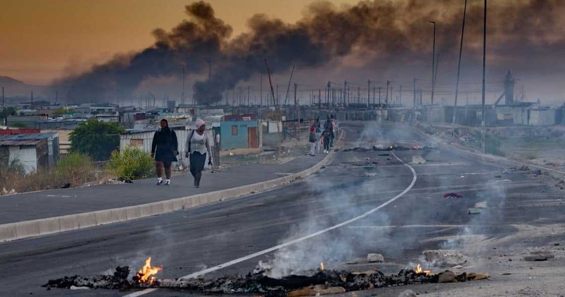 Protestor, Fire, South Africa Protestor, Fire, South Africa