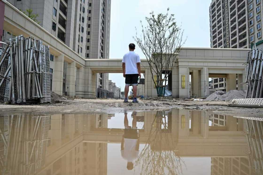 "There's no point getting angry, because there's nothing I can do," said homebuyer Wang "There's no point getting angry, because there's nothing I can do," said homebuyer Wang