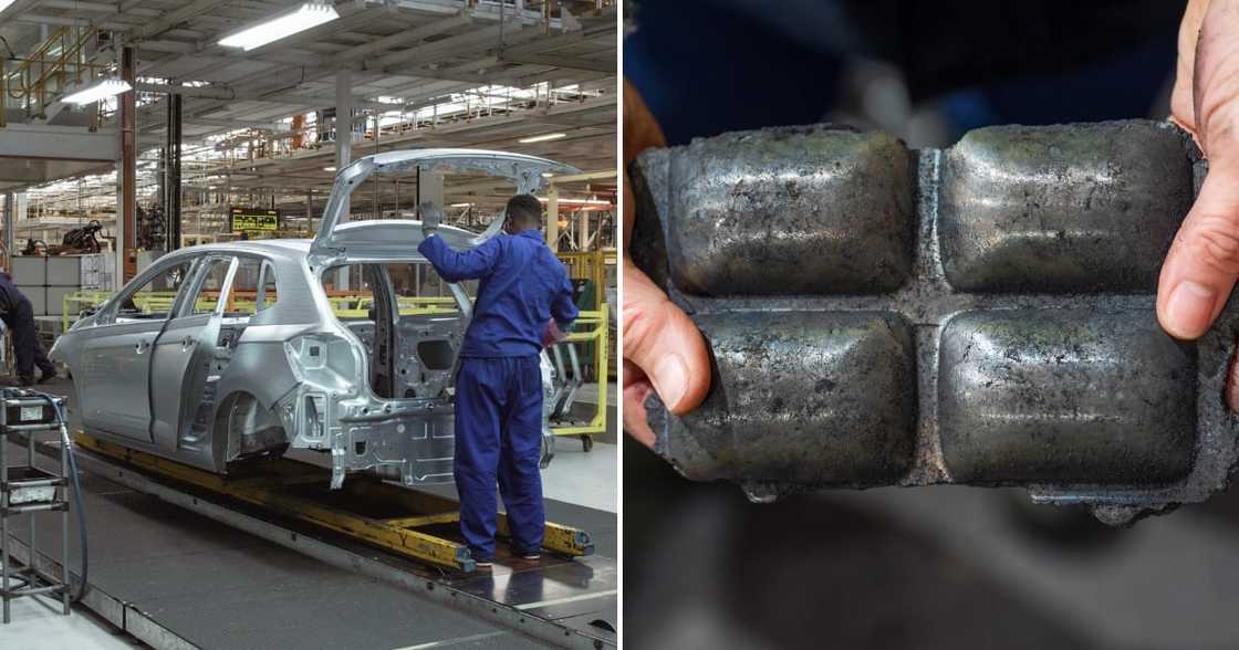 Employees work on manufacturing a car at a Volkswagen plant