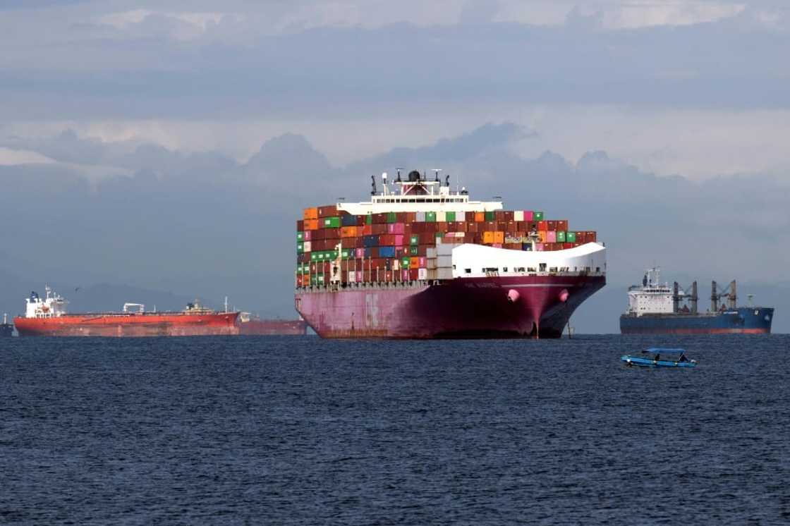 A container ship waits to enter the Panama Canal on September 24, 2023