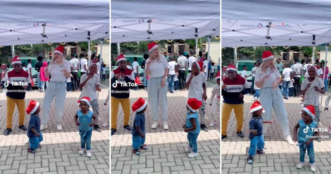 Mrs Bullock dancing with adorable children