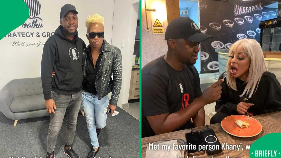 Founder of Ophin wear feeding Khanyi Mbau on the right Founder of Ophin wear feeding Khanyi Mbau on the right