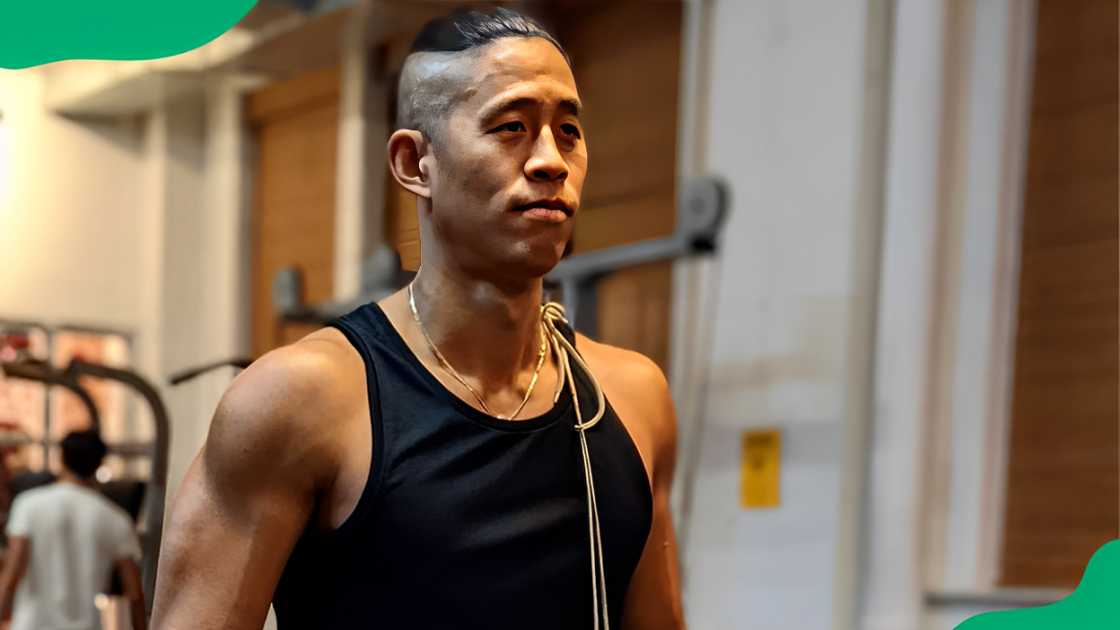 Dan Wai trains hard at the gym. Dan Wai trains hard at the gym.