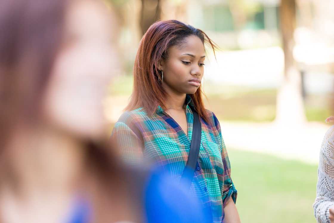 Sad girl walking outdoors Sad girl walking outdoors