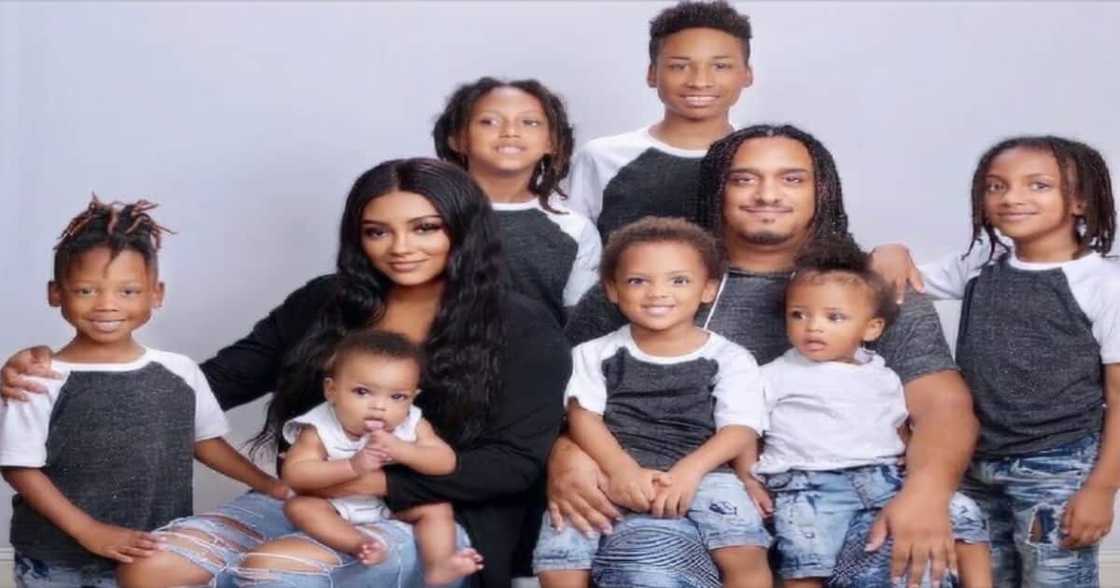 Woman excited at the prospect of welcoming a ninth son into the world. Woman excited at the prospect of welcoming a ninth son into the world.