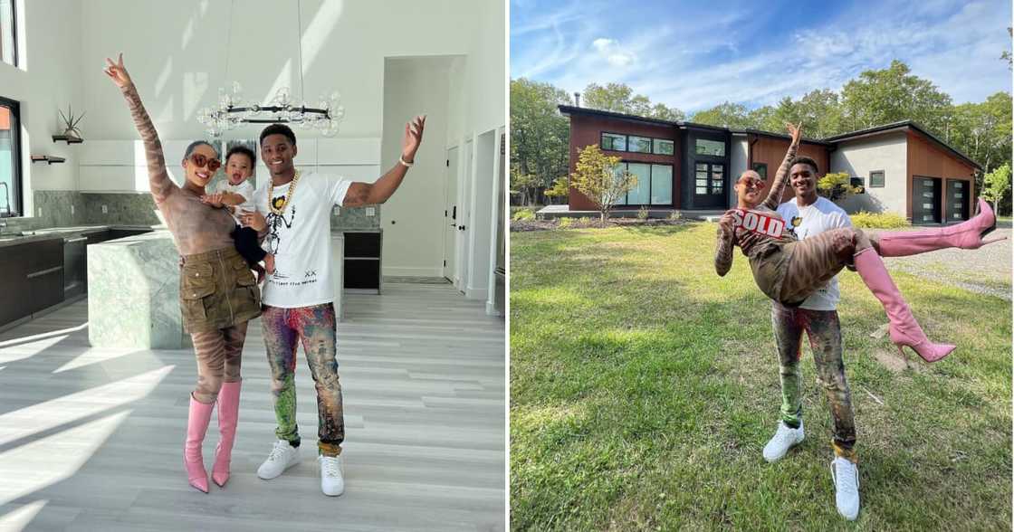 A young couple celebrated purchasing a new home A young couple celebrated purchasing a new home