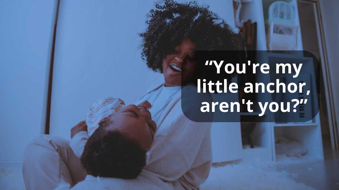 A woman rocking her son to sleep A woman rocking her son to sleep