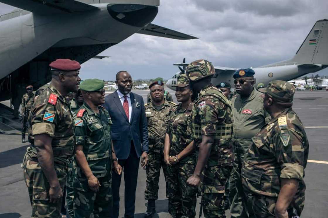 The Kenyan troops were greeted by local dignitaries The Kenyan troops were greeted by local dignitaries