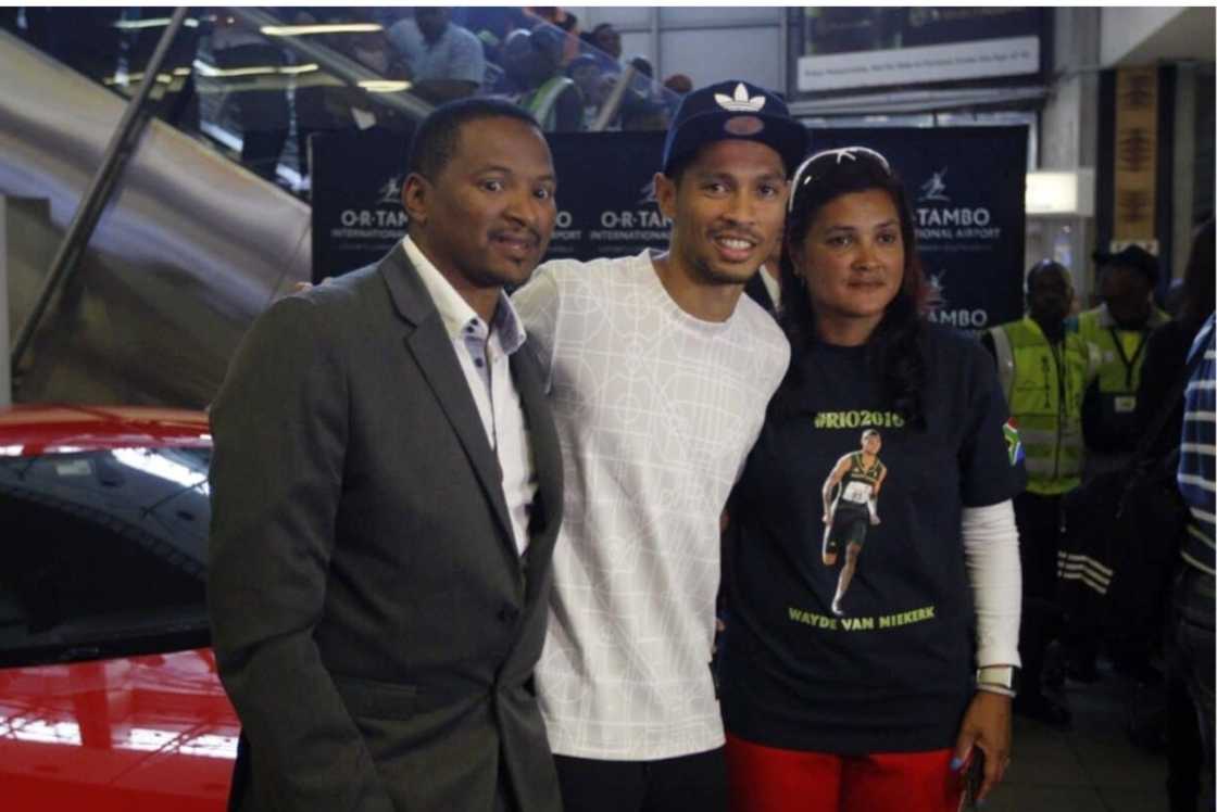 Steven Swarts (left) with Wayde van Niekerk and Odessa Swarts.