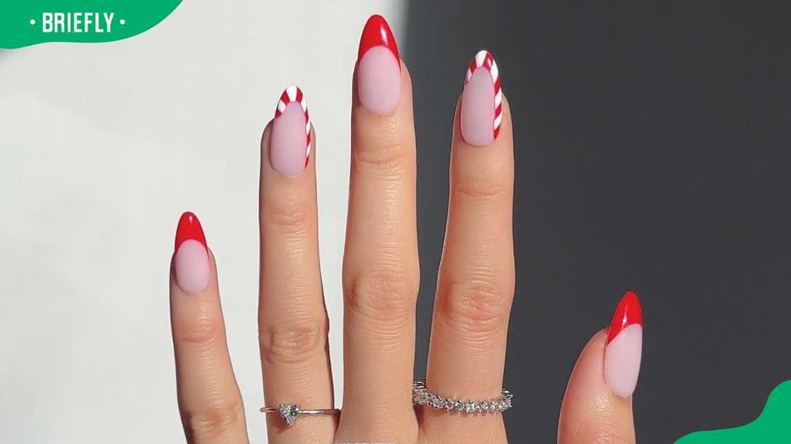 Candy cane french tips nails Candy cane french tips nails