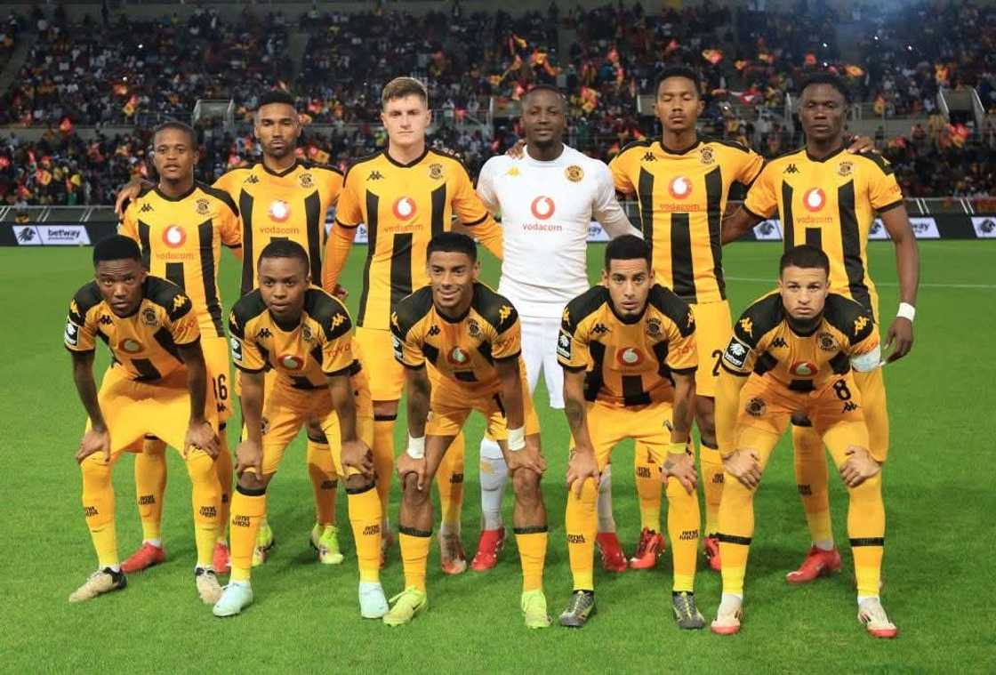 Kaizer Chiefs players line up for a pre-match team photo in their home kit. Kaizer Chiefs players line up for a pre-match team photo in their home kit.