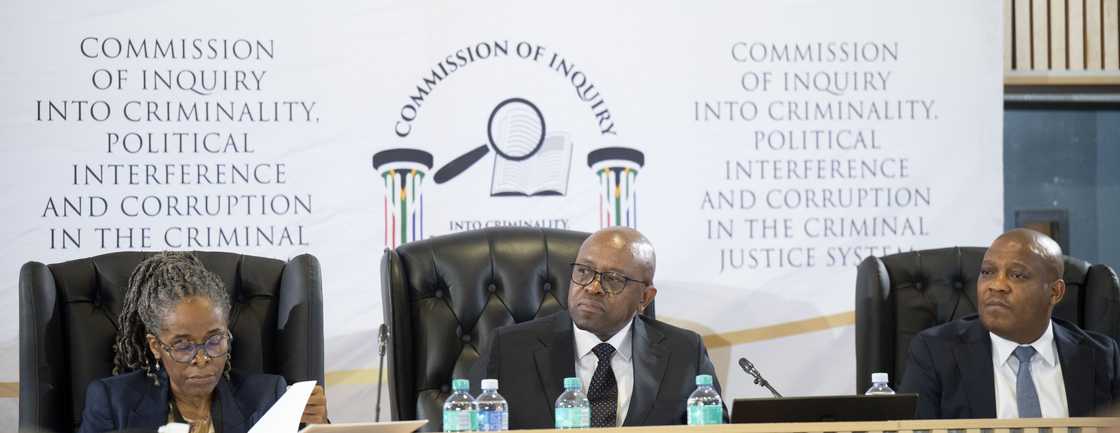 Former Judge Mbuyiseli Madlanga and his two assistants, (L) Adv. Sesi Baloyi SC and (R) Adv. Sandile Khumalo SC Former Judge Mbuyiseli Madlanga and his two assistants, (L) Adv. Sesi Baloyi SC and (R) Adv. Sandile Khumalo SC