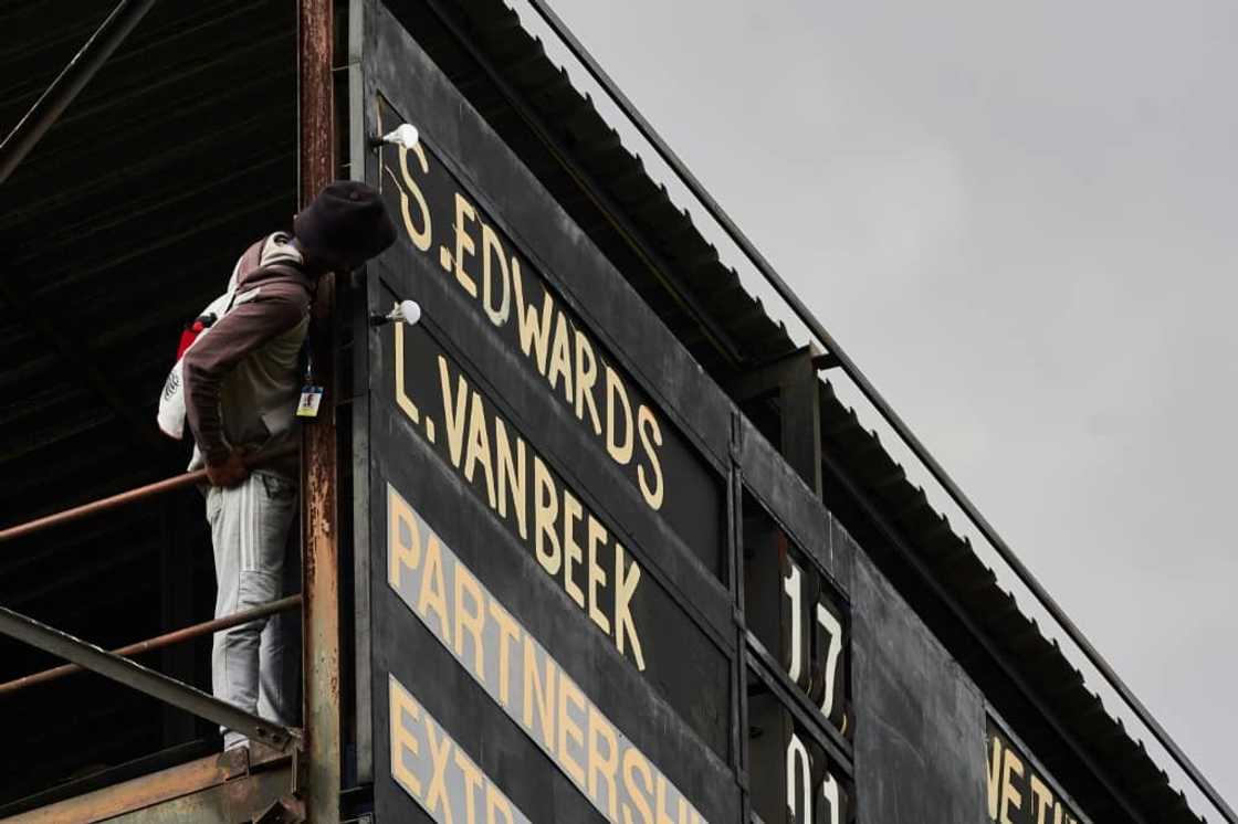 The manually operated scoreboard in Bulawayo is one of the last of its kind in international cricket The manually operated scoreboard in Bulawayo is one of the last of its kind in international cricket