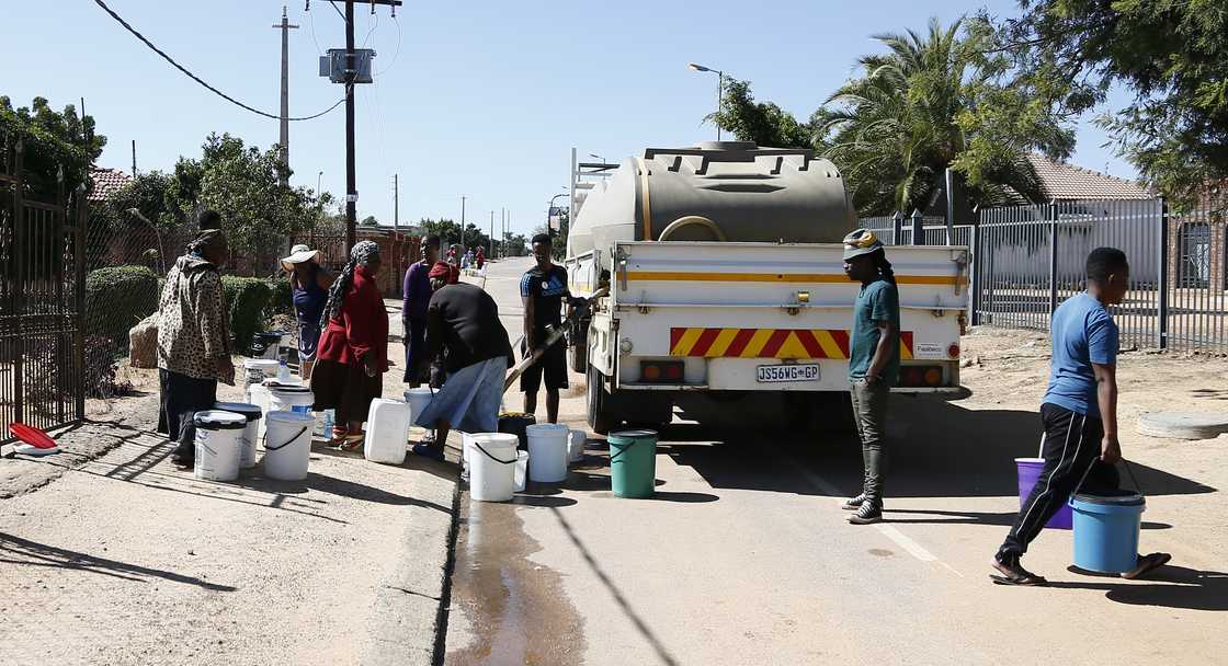 People queueing for water tankers has become an all too familiar site