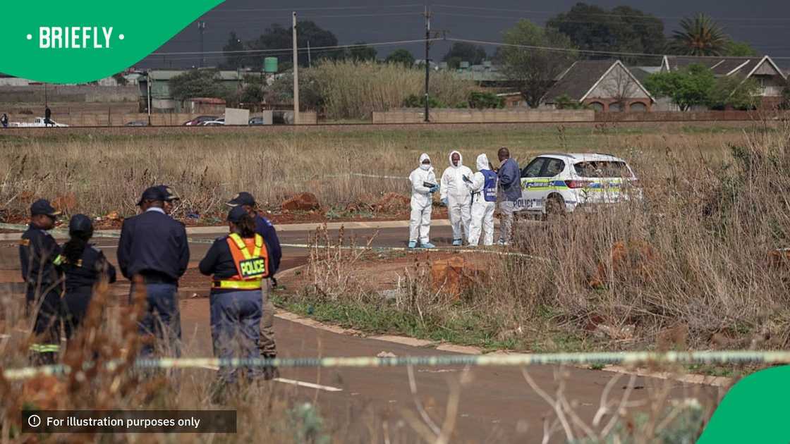 Members of the South African Police Service (SAPS) Forensic Pathology Services work on the crime scene where the body of a woman was discovered in Boksburg on September 17, 2026 Members of the South African Police Service (SAPS) Forensic Pathology Services work on the crime scene where the body of a woman was discovered in Boksburg on September 17, 2026