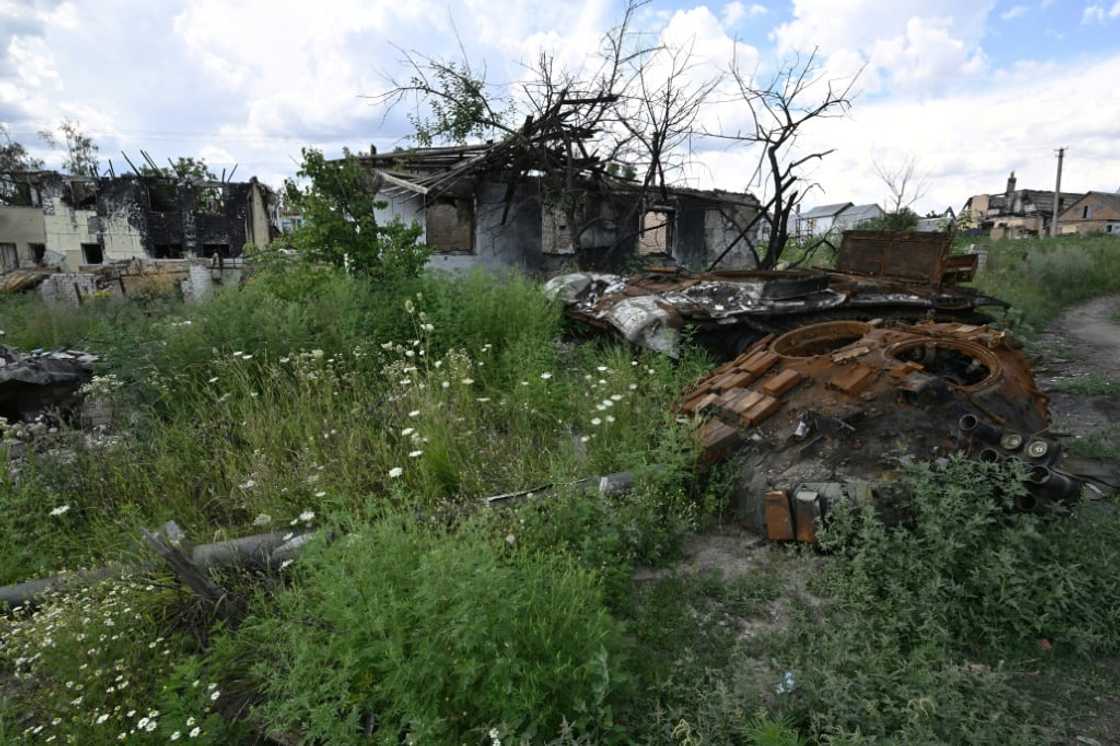 Months after Moscow's army were forced from the village of Mala Rogan in the Kharkiv region of Ukraine, their ruined military equipment remains strewn between damanged homes Months after Moscow's army were forced from the village of Mala Rogan in the Kharkiv region of Ukraine, their ruined military equipment remains strewn between damanged homes