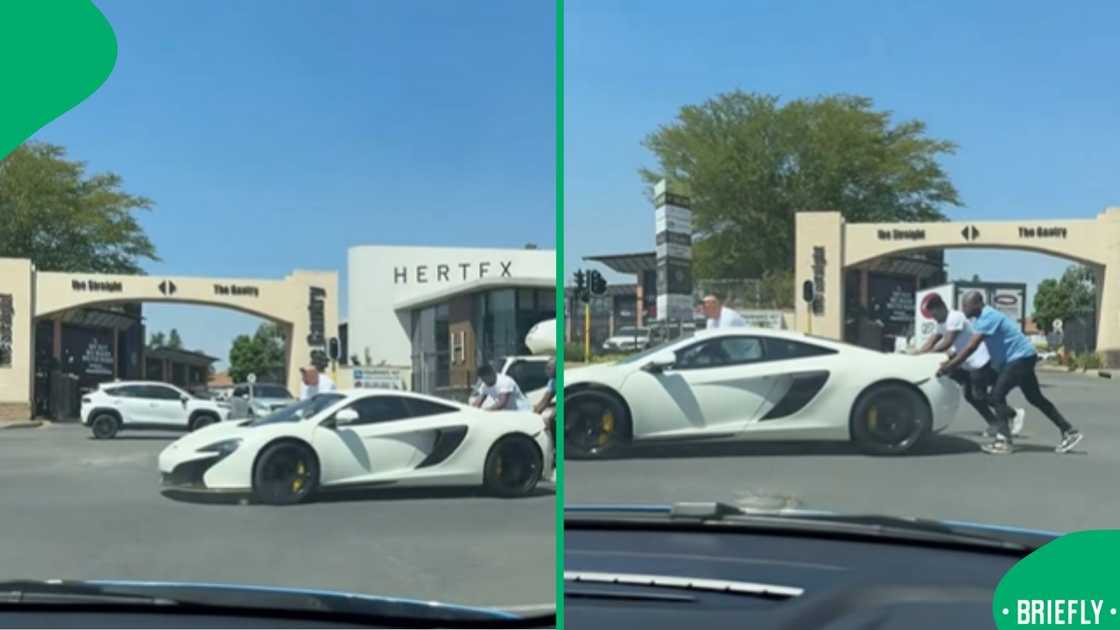 A screenshot from the TikTok video showing a white McLaren MP4-12C being pushed on the road