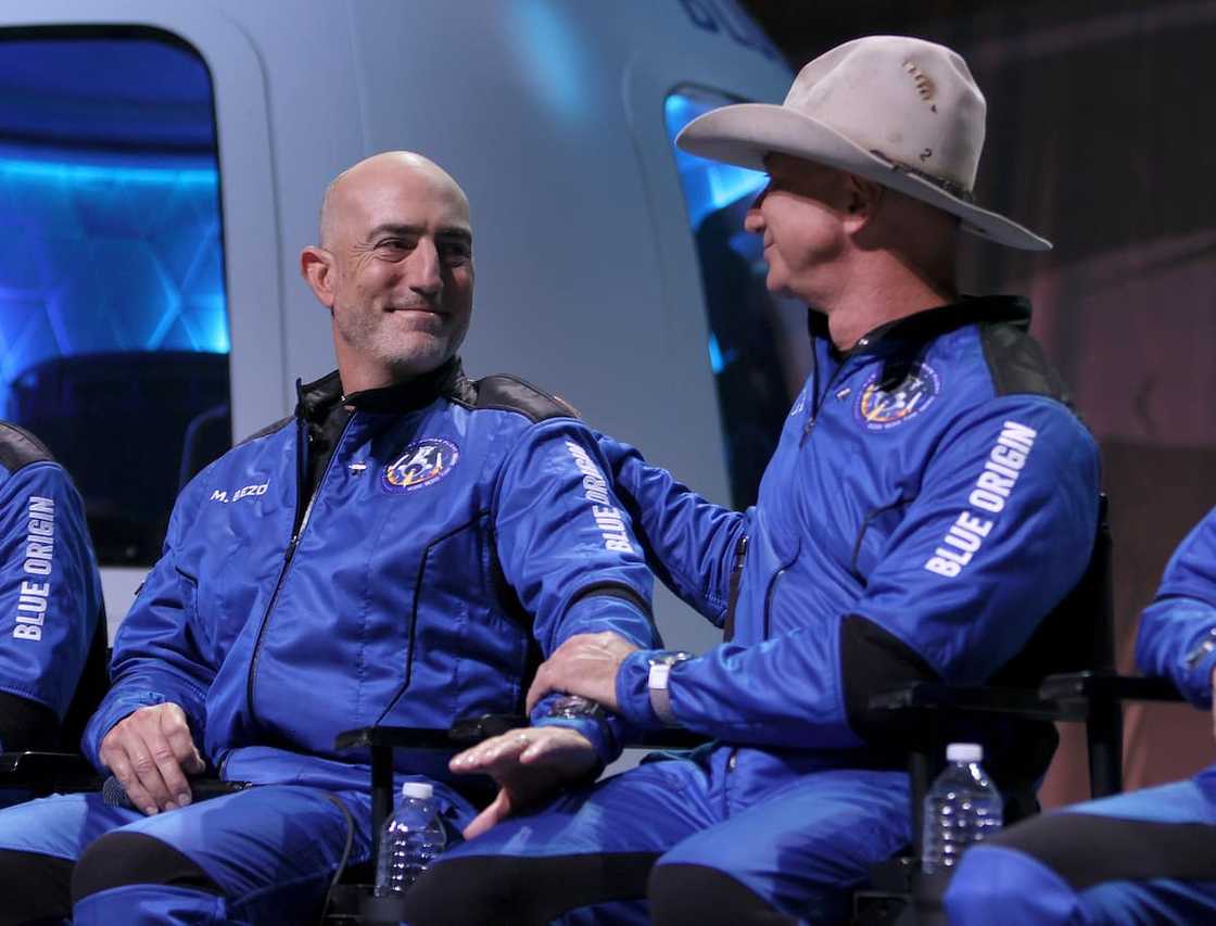 Mark Bezos and his brother Jeff during a press conference after flying into space in the Blue Origin New Shepard on 20 July 2021 in Van Horn, Texas. Mark Bezos and his brother Jeff during a press conference after flying into space in the Blue Origin New Shepard on 20 July 2021 in Van Horn, Texas.