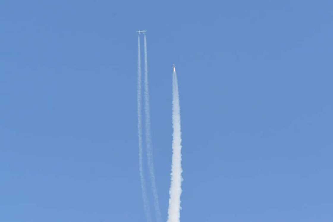 The Virgin Galactic SpaceShipTwo space plane Unity and mothership separate as they fly way above Spaceport America in New Mexico on July 11, 2021 The Virgin Galactic SpaceShipTwo space plane Unity and mothership separate as they fly way above Spaceport America in New Mexico on July 11, 2021