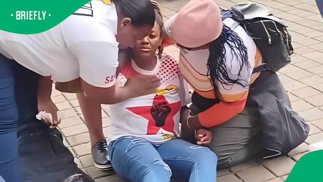 A woman was in tears over unpaid salaries.