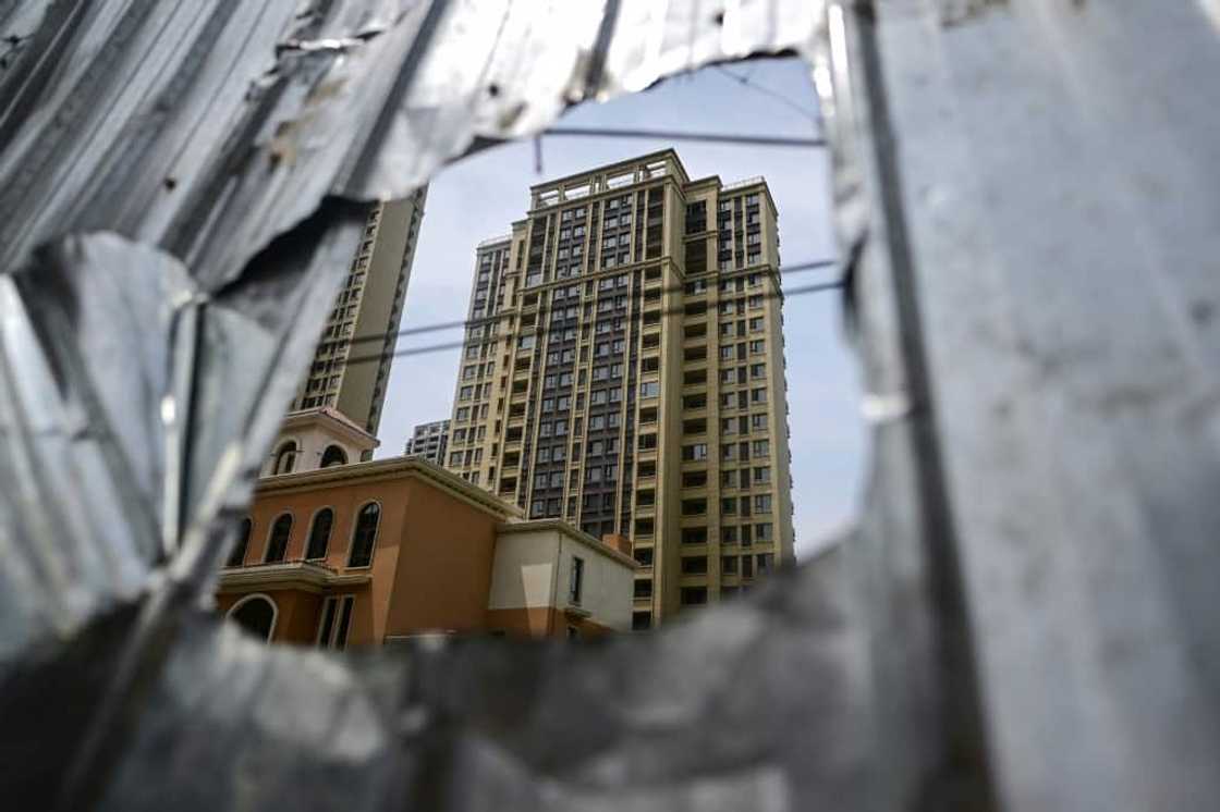 Authorities in multiple regions have moved to stifle public complaints about unfinished homes in recent months, according to mortgage boycott participants contacted by AFP