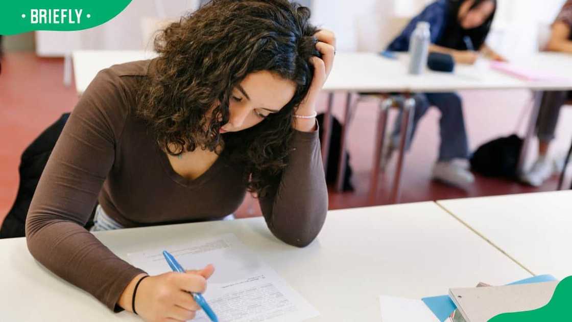 A young female studying