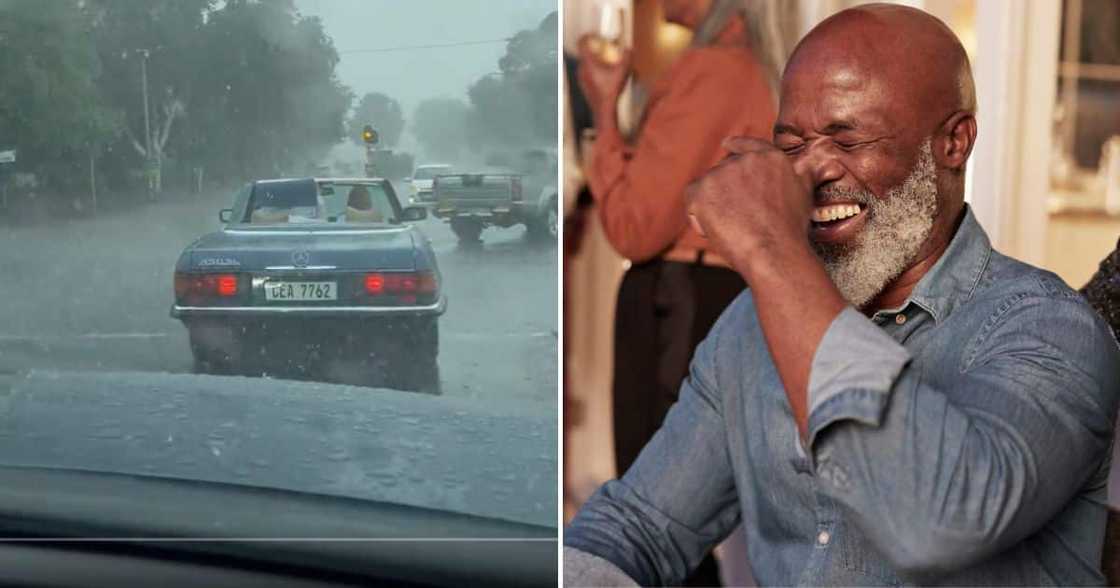 couple driving in old fashioned Mercedes convertible in rain