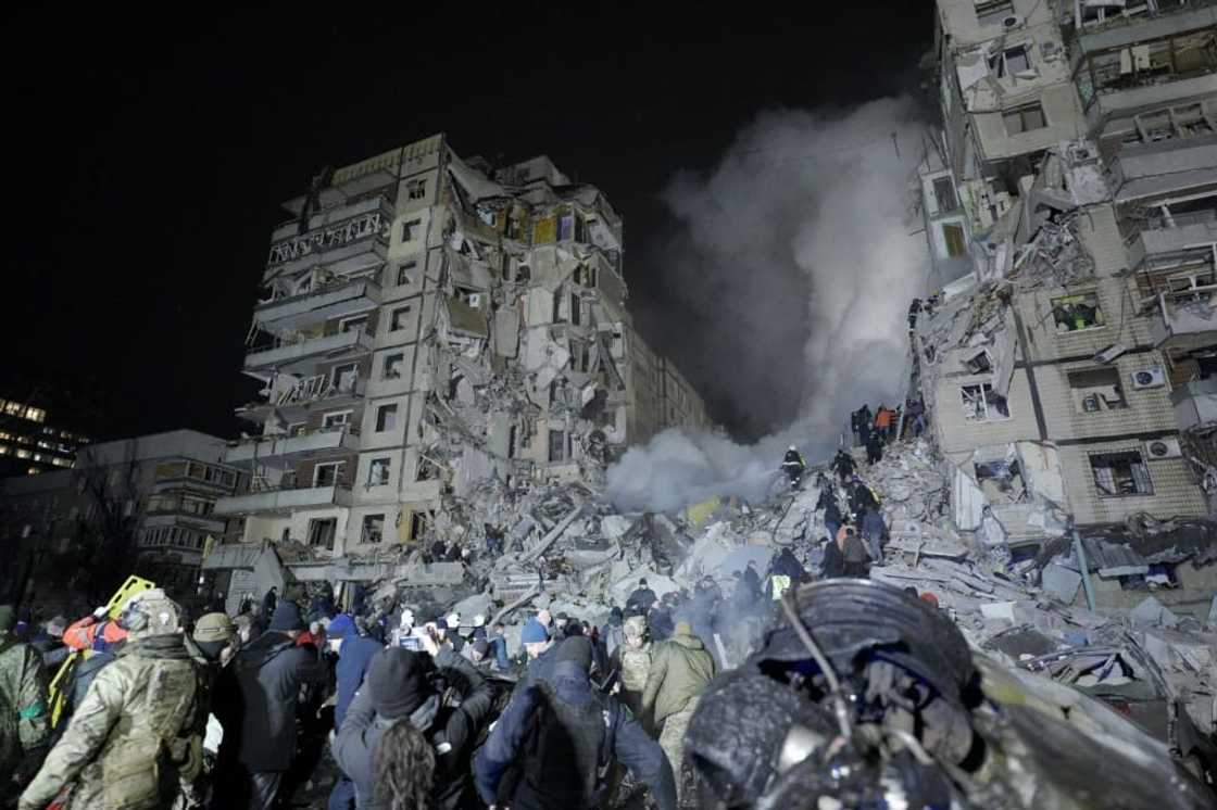 A residential building destroyed after a missile strike in the Ukrainian city of Dnipro on January 14, 2023 A residential building destroyed after a missile strike in the Ukrainian city of Dnipro on January 14, 2023