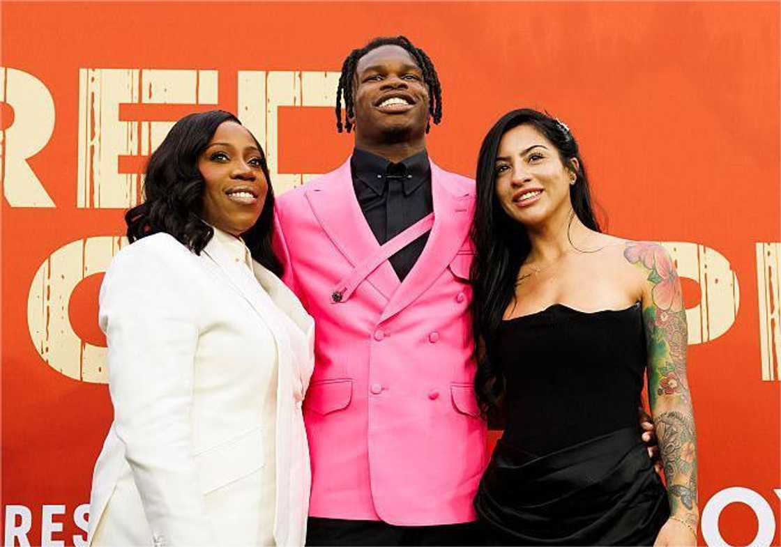 Wide Receiver/Cornerback Travis Hunter of Colorado with Ferrante Harris and Leanna Lenee Wide Receiver/Cornerback Travis Hunter of Colorado with Ferrante Harris and Leanna Lenee