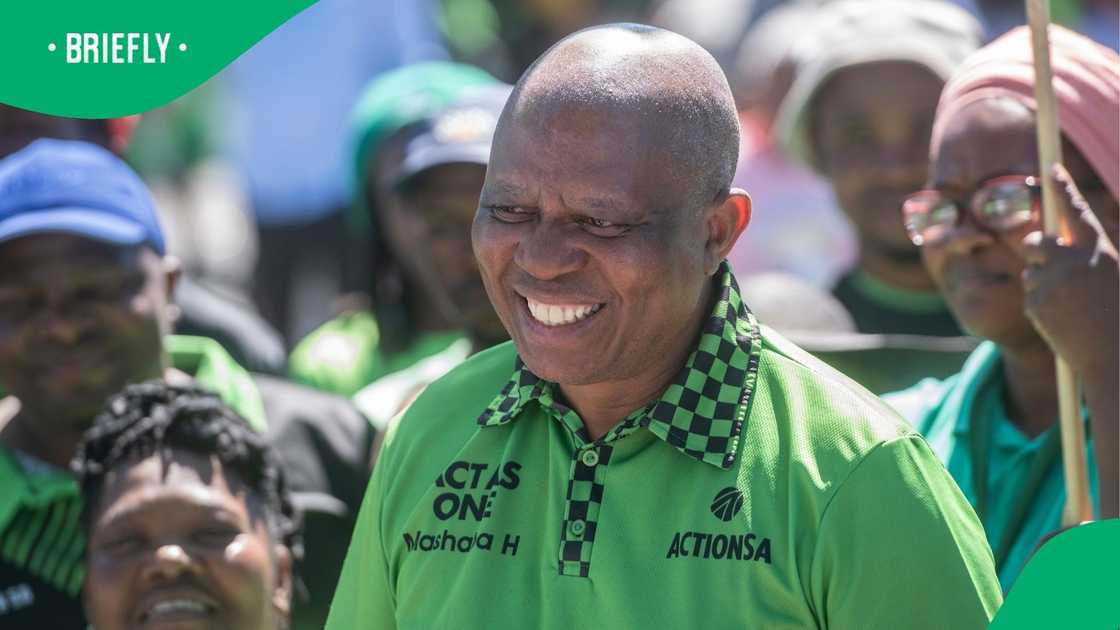 Herman Mashaba smiles while engaging with ActionSA supporters. The party recently hinted they could break their coalition with the DA in Tshwane.