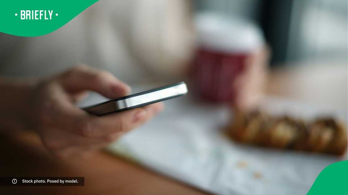 A person typing on their phone.