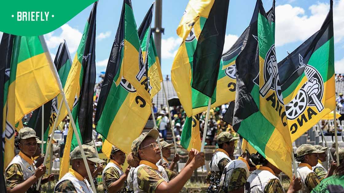 Members of Umkhonto weSizwe (MK), the former paramilitary wing of the African National Congress (ANC), hold flags as they dance during the ANC's 114th anniversary celebration at the Moruleng Stadium in Rustenburg on January 10, 2026 Members of Umkhonto weSizwe (MK), the former paramilitary wing of the African National Congress (ANC), hold flags as they dance during the ANC's 114th anniversary celebration at the Moruleng Stadium in Rustenburg on January 10, 2026