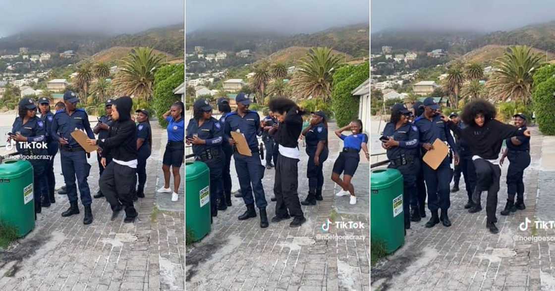 A man randomly dances for South African policeman A man randomly dances for South African policeman