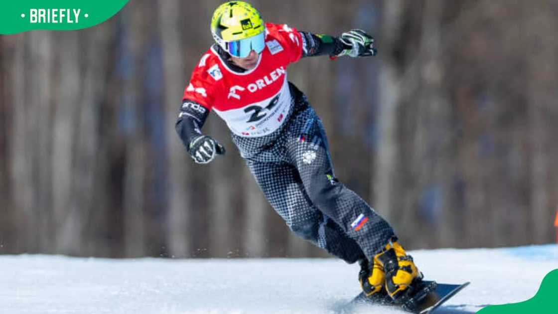 Tim Mastnak competes in snowboard