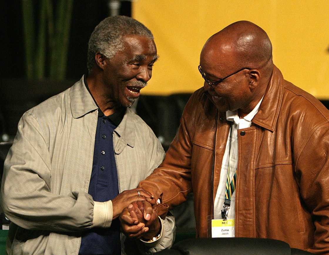 Thabo Mbeki and Jacob Zuma sharing a handshake at the Polokwane elective conference Thabo Mbeki and Jacob Zuma sharing a handshake at the Polokwane elective conference
