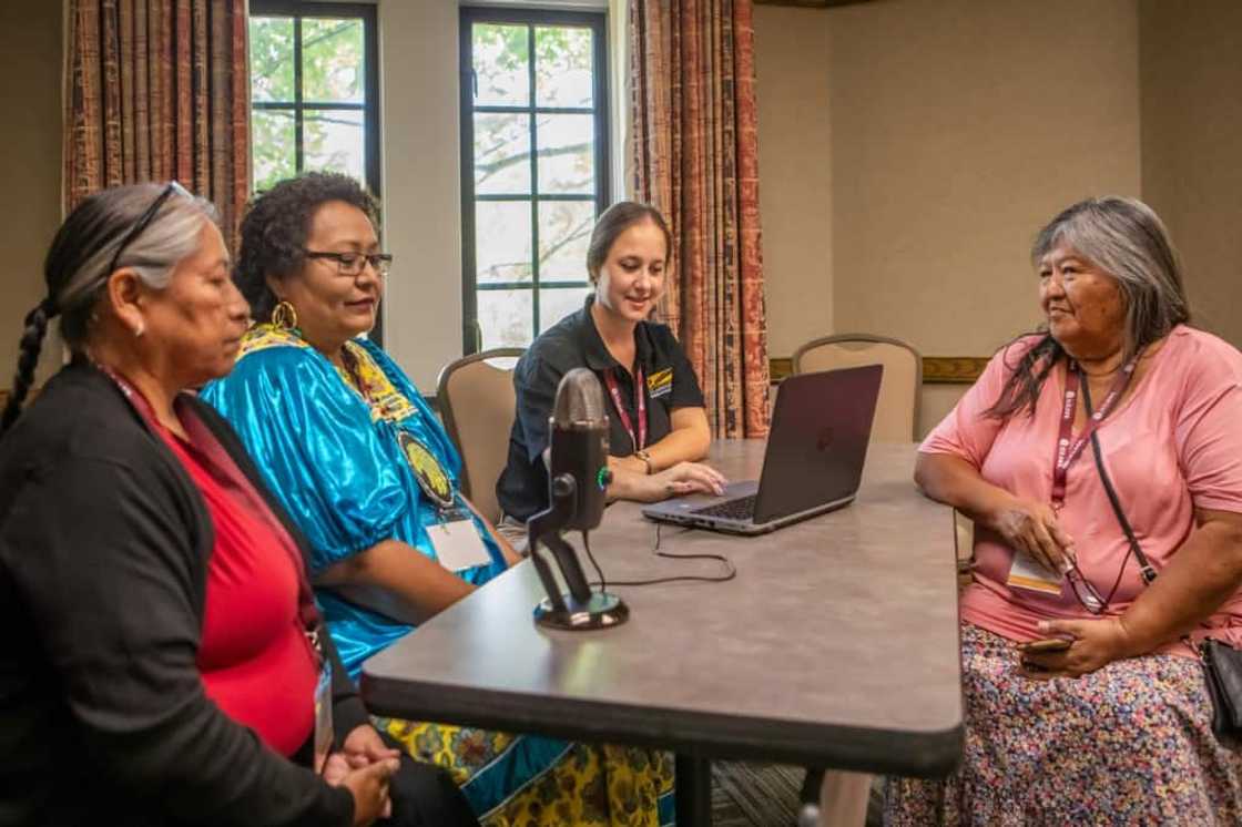 Ashleigh Surma (second right) assists Elva Case (left), Linda Lupe (second left) and Joycelene Johnson (right) in recording Indigenous languages in Bloomington, Indiana, on October 13, 2023