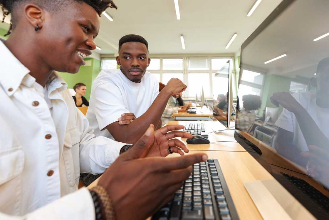 Students in a computer lab Students in a computer lab