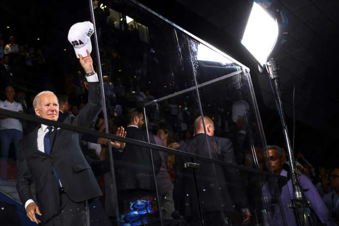 US President Joe Biden greets fans as he attends the opening ceremony of the Maccabiah Games at Teddy Stadium in Jerusalem on July 14 US President Joe Biden greets fans as he attends the opening ceremony of the Maccabiah Games at Teddy Stadium in Jerusalem on July 14