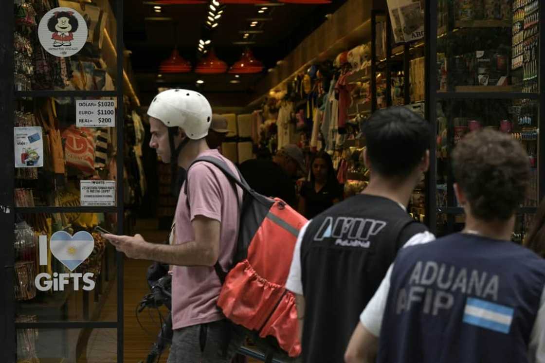 Argentine President Javier Milei began his term in December by devaluing the peso by more than 50 percent, slashing transport and fuel subsidies, and getting rid of price controls Argentine President Javier Milei began his term in December by devaluing the peso by more than 50 percent, slashing transport and fuel subsidies, and getting rid of price controls