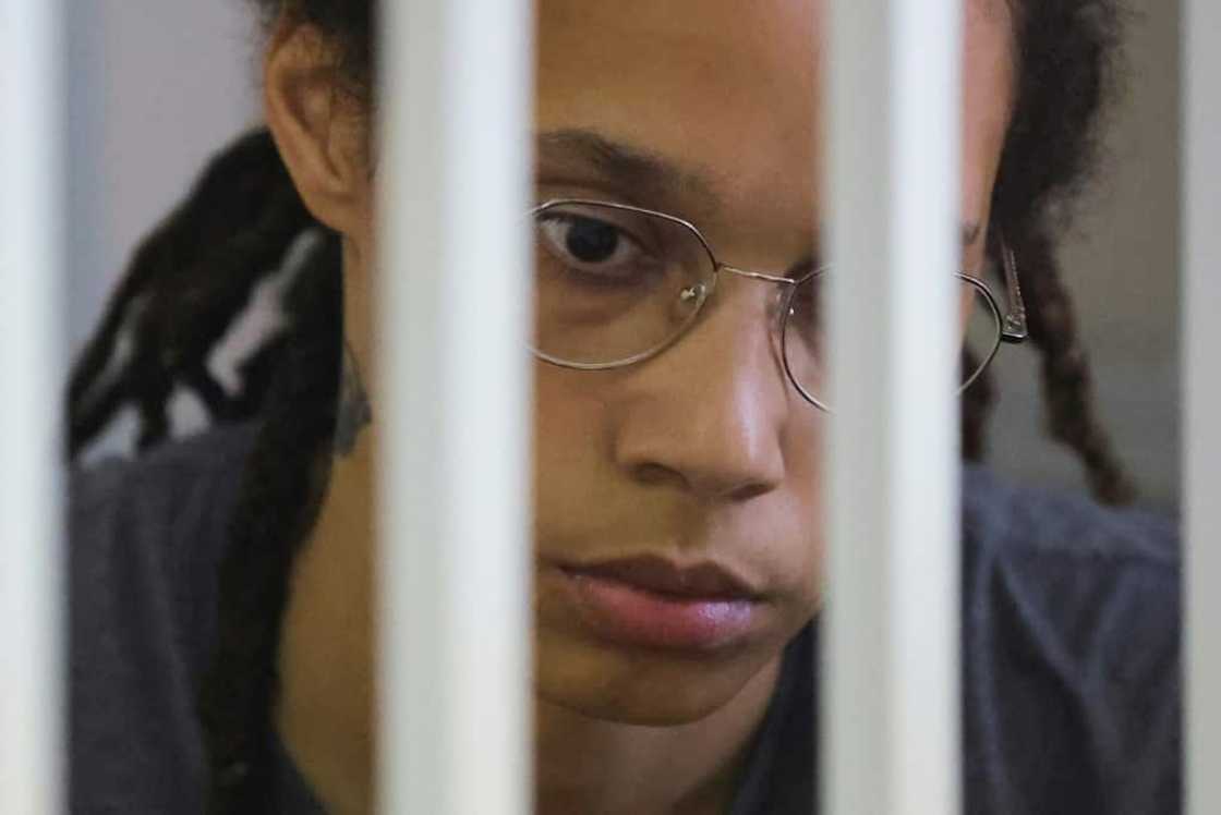 Basketball star Brittney Griner waits for the verdict inside a defendants' cage during a hearing in Khimki outside Moscow in August 2022 Basketball star Brittney Griner waits for the verdict inside a defendants' cage during a hearing in Khimki outside Moscow in August 2022