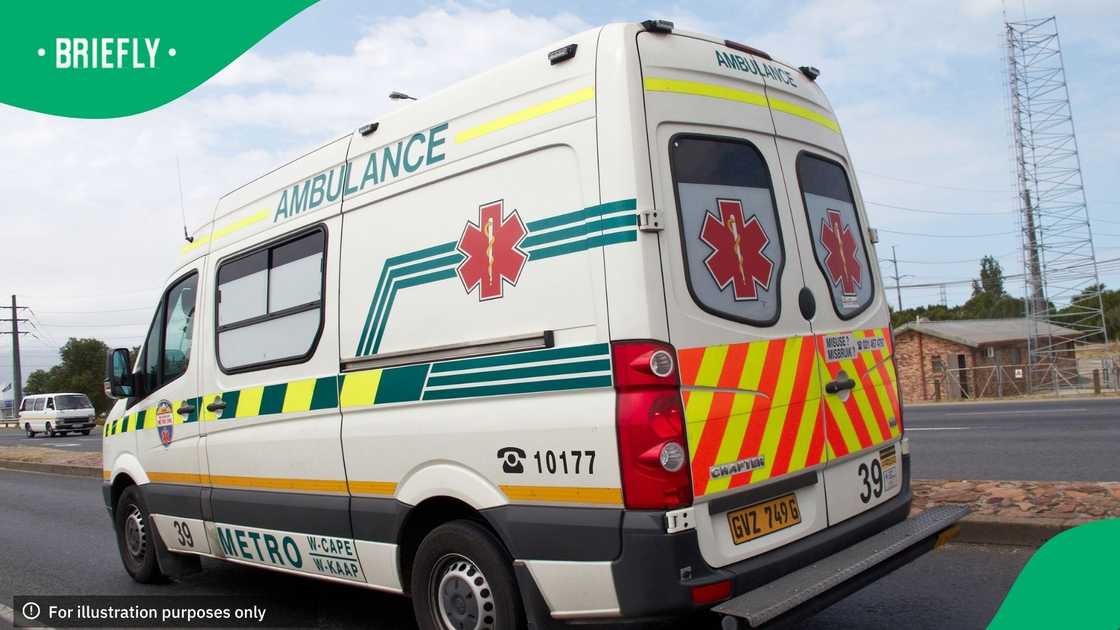 Cape Town, South Africa - February 7, 2012: South African ambulance heading out of Cape Town on the N2 road