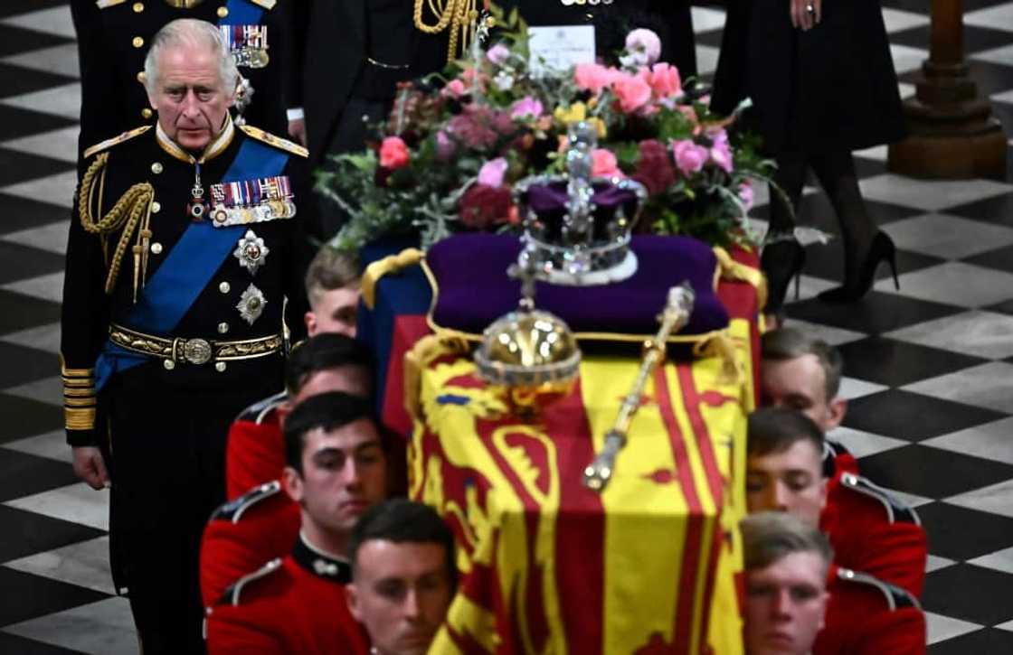 The king's message on the floral tribute to his mother read: 'In loving and devoted memory. Charles R.' The king's message on the floral tribute to his mother read: 'In loving and devoted memory. Charles R.'