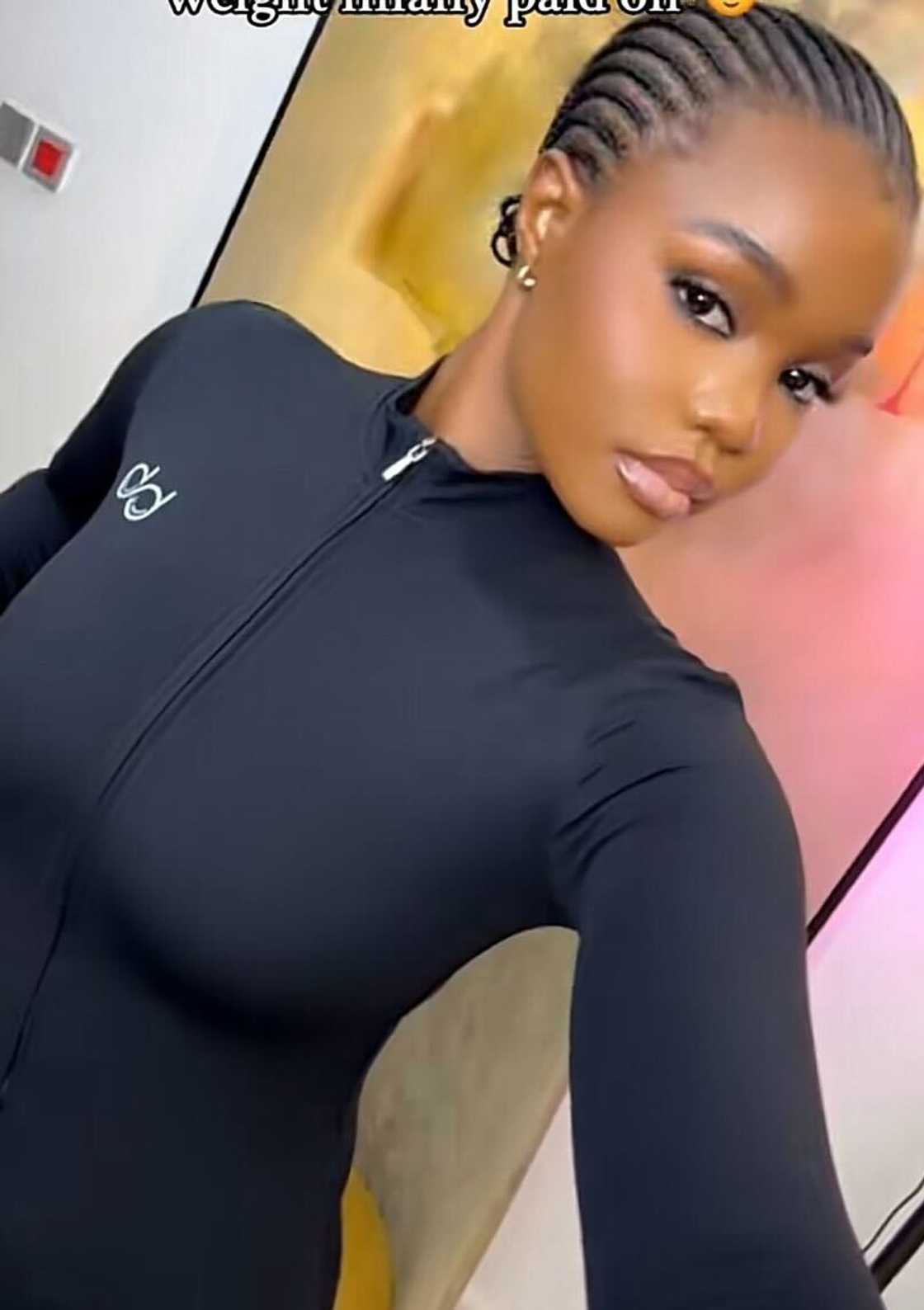 A woman who list so much weight poed in a TikTok video. A woman who list so much weight poed in a TikTok video.