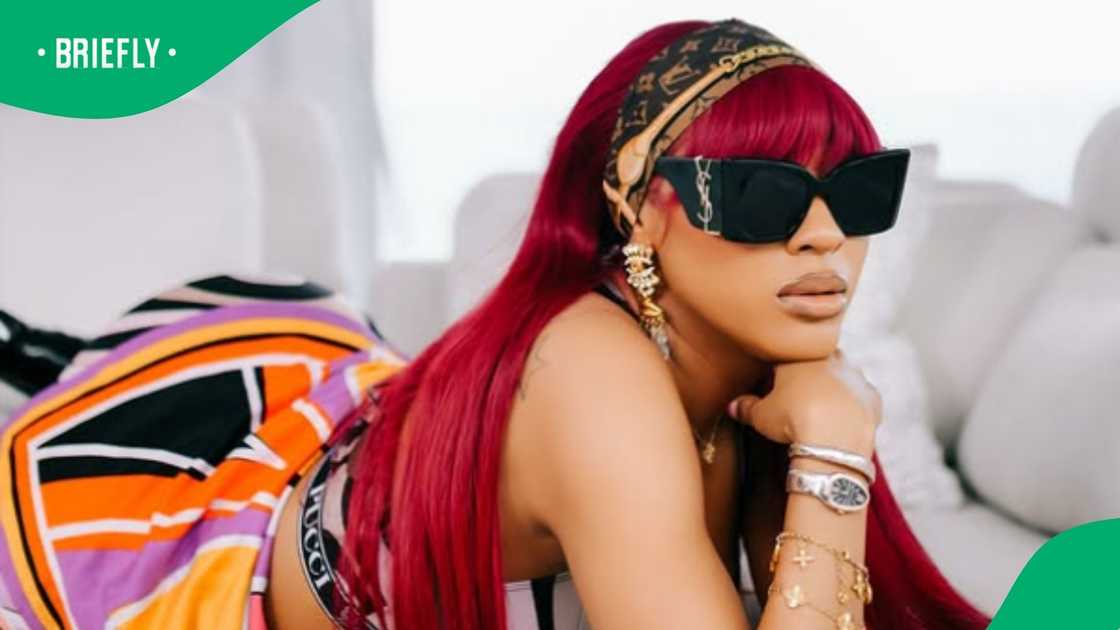 Nadia Nakai is wearing a moonboot. Nadia Nakai is wearing a moonboot.