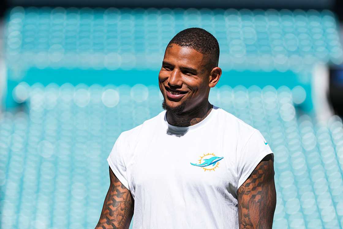 Darren Waller #83 of the Miami Dolphins warms up prior to an NFL football game against the Los Angeles Chargers